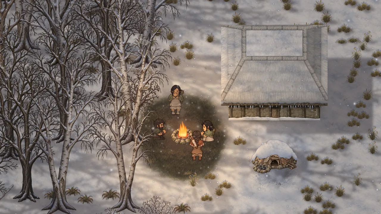 Villagers warming up by the fire in a snowy camp
